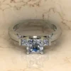 01_136c9fcc-c993-4f06-b4d6-28686c4a0680_600x600 Princess Moissanite Solitaire 3 Stone Diamond Vintage Engagement Ring, Moissanite Wedding Ring, Silver Moissanite Diamond Women Ring, Proposal Gold Ring For Her